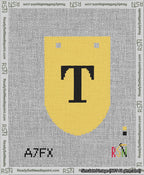 A taped needlepoint canvas with the design: Banner 13 mesh count Rounded T Black on Yellow.
