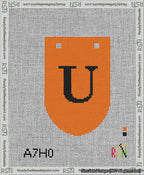 A taped needlepoint canvas with the design: Banner 13 mesh count Rounded U Black on Orange.
