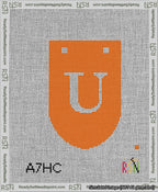 A taped needlepoint canvas with the design: Banner 13 mesh count Rounded U White on Orange.
