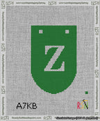 A taped needlepoint canvas with the design: Banner 13 mesh count Rounded Z White on Green.