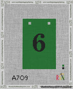 A taped needlepoint canvas with the design: Banner 13 mesh count Squared 6 Black on Green.