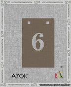 A taped needlepoint canvas with the design: Banner 13 mesh count Squared 6 White on Brown.