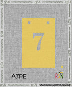 A taped needlepoint canvas with the design: Banner 13 mesh count Squared 7 White on Yellow.