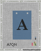 A taped needlepoint canvas with the design: Banner 13 mesh count Squared A Black on Blue.