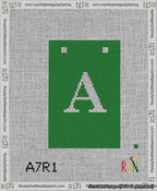 A taped needlepoint canvas with the design: Banner 13 mesh count Squared A White on Green.