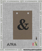 A taped needlepoint canvas with the design: Banner 13 mesh count Squared Ampersand Black on Brown.