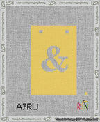 A taped needlepoint canvas with the design: Banner 13 mesh count Squared Ampersand White on Yellow.