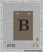A taped needlepoint canvas with the design: Banner 13 mesh count Squared B Black on Brown.