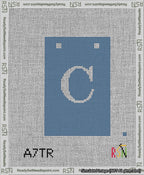 A taped needlepoint canvas with the design: Banner 13 mesh count Squared C White on Blue.