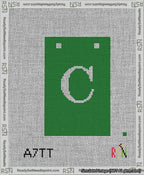 A taped needlepoint canvas with the design: Banner 13 mesh count Squared C White on Green.