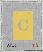 A taped needlepoint canvas with the design: Banner 13 mesh count Squared C White on Yellow.