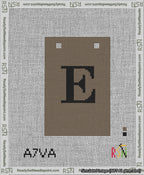 A taped needlepoint canvas with the design: Banner 13 mesh count Squared E Black on Brown.