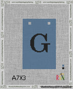 A taped needlepoint canvas with the design: Banner 13 mesh count Squared G Black on Blue.