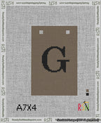 A taped needlepoint canvas with the design: Banner 13 mesh count Squared G Black on Brown.