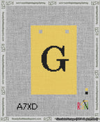 A taped needlepoint canvas with the design: Banner 13 mesh count Squared G Black on Yellow.