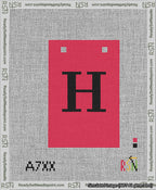 A taped needlepoint canvas with the design: Banner 13 mesh count Squared H Black on Red.