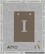 A taped needlepoint canvas with the design: Banner 13 mesh count Squared I White on Brown.