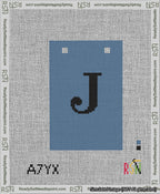 A taped needlepoint canvas with the design: Banner 13 mesh count Squared J Black on Blue.