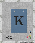 A taped needlepoint canvas with the design: Banner 13 mesh count Squared K Black on Blue.