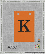 A taped needlepoint canvas with the design: Banner 13 mesh count Squared K Black on Orange.