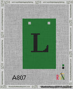 A taped needlepoint canvas with the design: Banner 13 mesh count Squared L Black on Green.