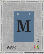 A taped needlepoint canvas with the design: Banner 13 mesh count Squared M Black on Blue.