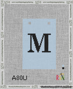 A taped needlepoint canvas with the design: Banner 13 mesh count Squared M Black on Light Blue.