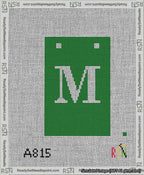 A taped needlepoint canvas with the design: Banner 13 mesh count Squared M White on Green.