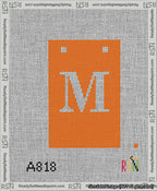 A taped needlepoint canvas with the design: Banner 13 mesh count Squared M White on Orange.