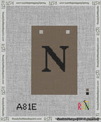 A taped needlepoint canvas with the design: Banner 13 mesh count Squared N Black on Brown.
