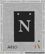 A taped needlepoint canvas with the design: Banner 13 mesh count Squared N White on Black.