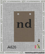 A taped needlepoint canvas with the design: Banner 13 mesh count Squared nd Black on Brown.