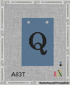 A taped needlepoint canvas with the design: Banner 13 mesh count Squared Q Black on Blue.