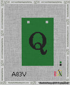 A taped needlepoint canvas with the design: Banner 13 mesh count Squared Q Black on Green.