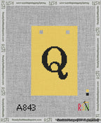 A taped needlepoint canvas with the design: Banner 13 mesh count Squared Q Black on Yellow.