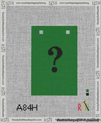 A taped needlepoint canvas with the design: Banner 13 mesh count Squared Question Black on Green.