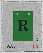 A taped needlepoint canvas with the design: Banner 13 mesh count Squared R Black on Green.