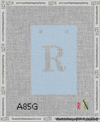 A taped needlepoint canvas with the design: Banner 13 mesh count Squared R White on Light Blue.