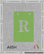 A taped needlepoint canvas with the design: Banner 13 mesh count Squared R White on Light Green.