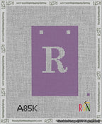 A taped needlepoint canvas with the design: Banner 13 mesh count Squared R White on Purple.