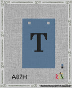 A taped needlepoint canvas with the design: Banner 13 mesh count Squared T Black on Blue.