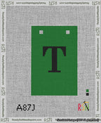 A taped needlepoint canvas with the design: Banner 13 mesh count Squared T Black on Green.