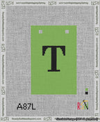A taped needlepoint canvas with the design: Banner 13 mesh count Squared T Black on Light Green.