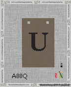 A taped needlepoint canvas with the design: Banner 13 mesh count Squared U Black on Brown.