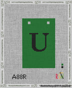 A taped needlepoint canvas with the design: Banner 13 mesh count Squared U Black on Green.
