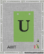 A taped needlepoint canvas with the design: Banner 13 mesh count Squared U Black on Light Green.