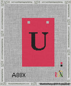A taped needlepoint canvas with the design: Banner 13 mesh count Squared U Black on Red.