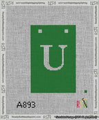 A taped needlepoint canvas with the design: Banner 13 mesh count Squared U White on Green.