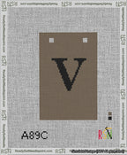 A taped needlepoint canvas with the design: Banner 13 mesh count Squared V Black on Brown.