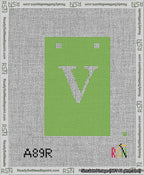 A taped needlepoint canvas with the design: Banner 13 mesh count Squared V White on Light Green.